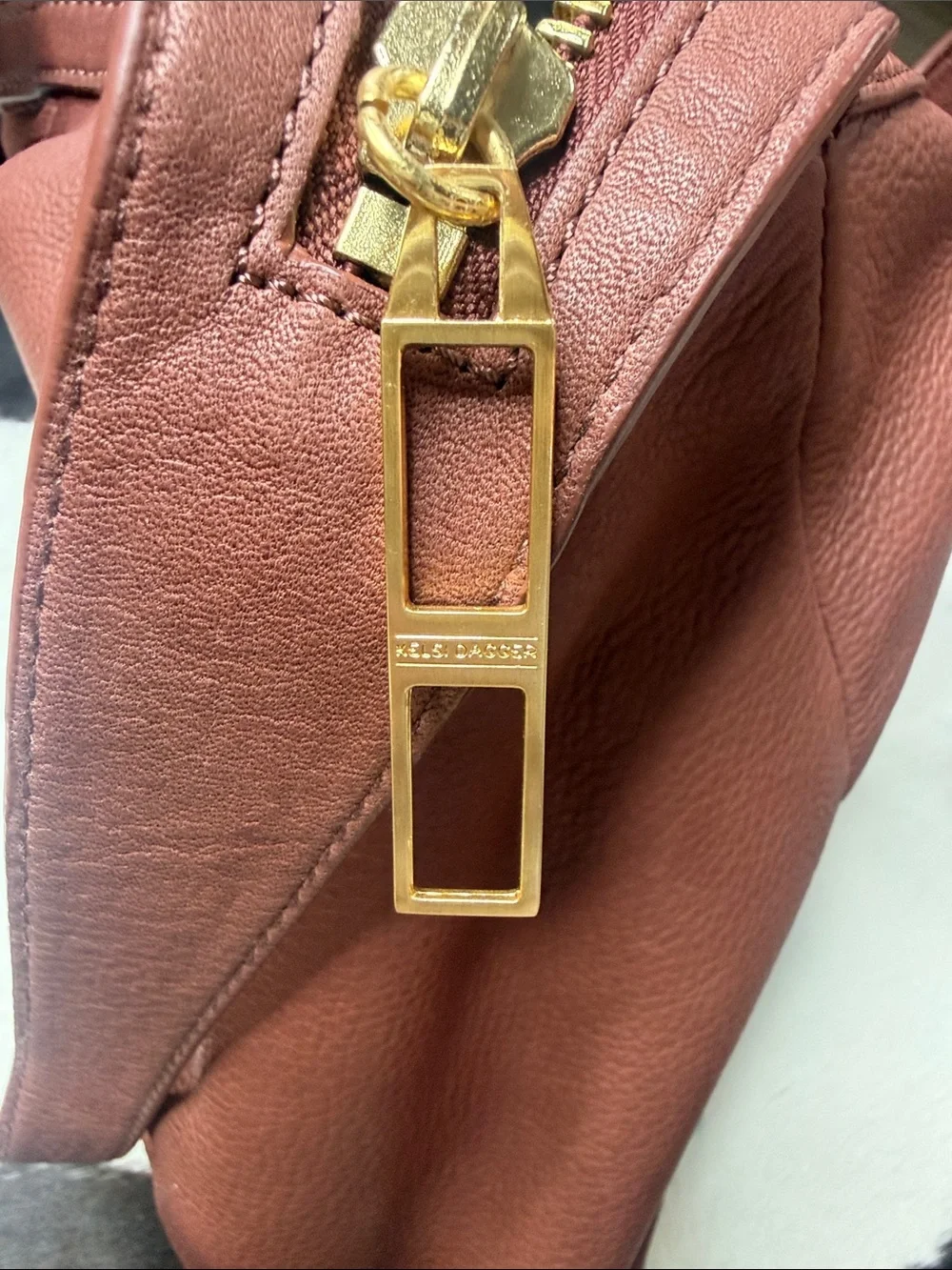 Kelsi Dagger Pebbled Leather Crossbody in Brick